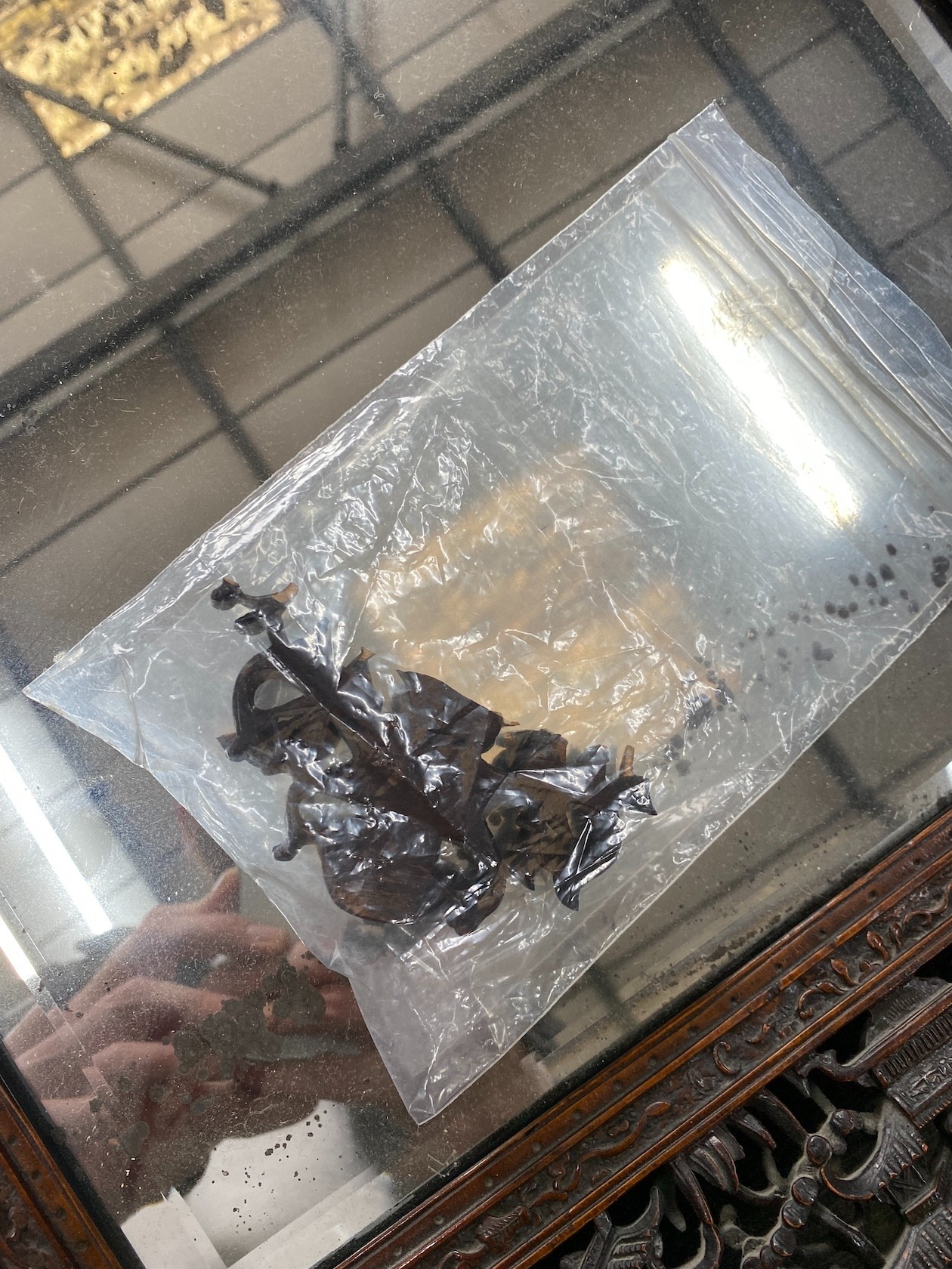 A Chinese rectangular carved hardwood wall mirror, width 52cm, height 64cm
